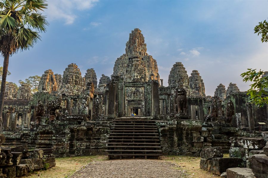 Carved stone face towers of the Bayon temple at Angkor Thom near Siem Reap